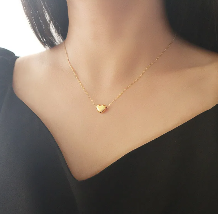 Gold heart necklace styling