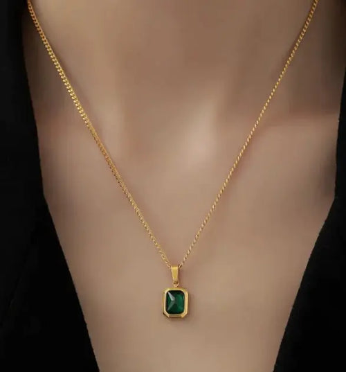 Close-up of emerald cubic zirconia pendant necklace